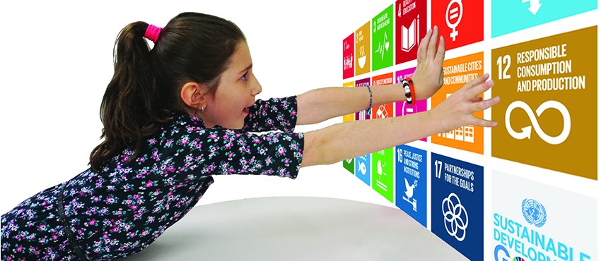 child reaching for SDGs
